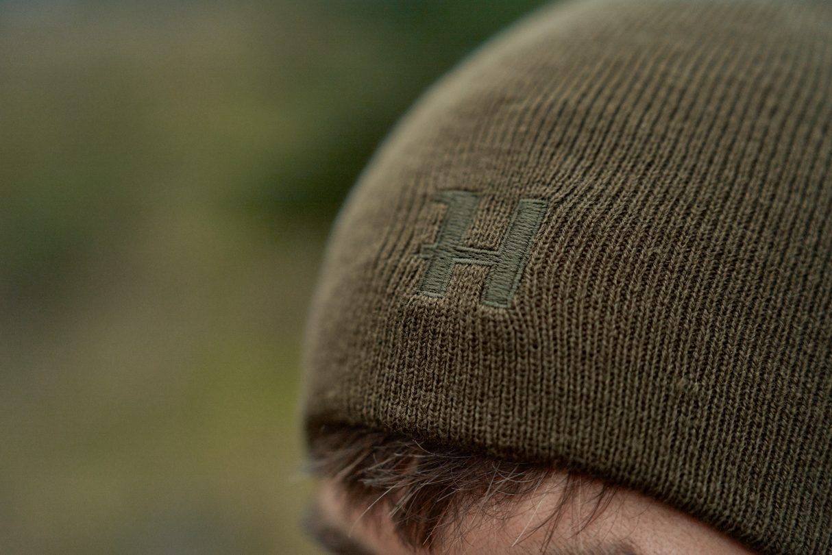 Vendbar lue – Willow Green/Orange – Härkila