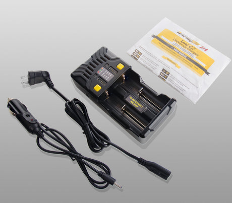 Uni C2 Lader / 2 kanaler / LED-indikator / Inngang AC 85–264V eller DC 12V / Utgang 2x1A / For IMR/Li-Ion, Ni-MH, Ni-Cd, LiFePO4, Ni-Zn / Type A eller Type C / Adapter for bil – Armytek